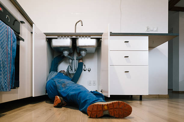 Professional Drain Cleaning technician working in Tontitown, AR